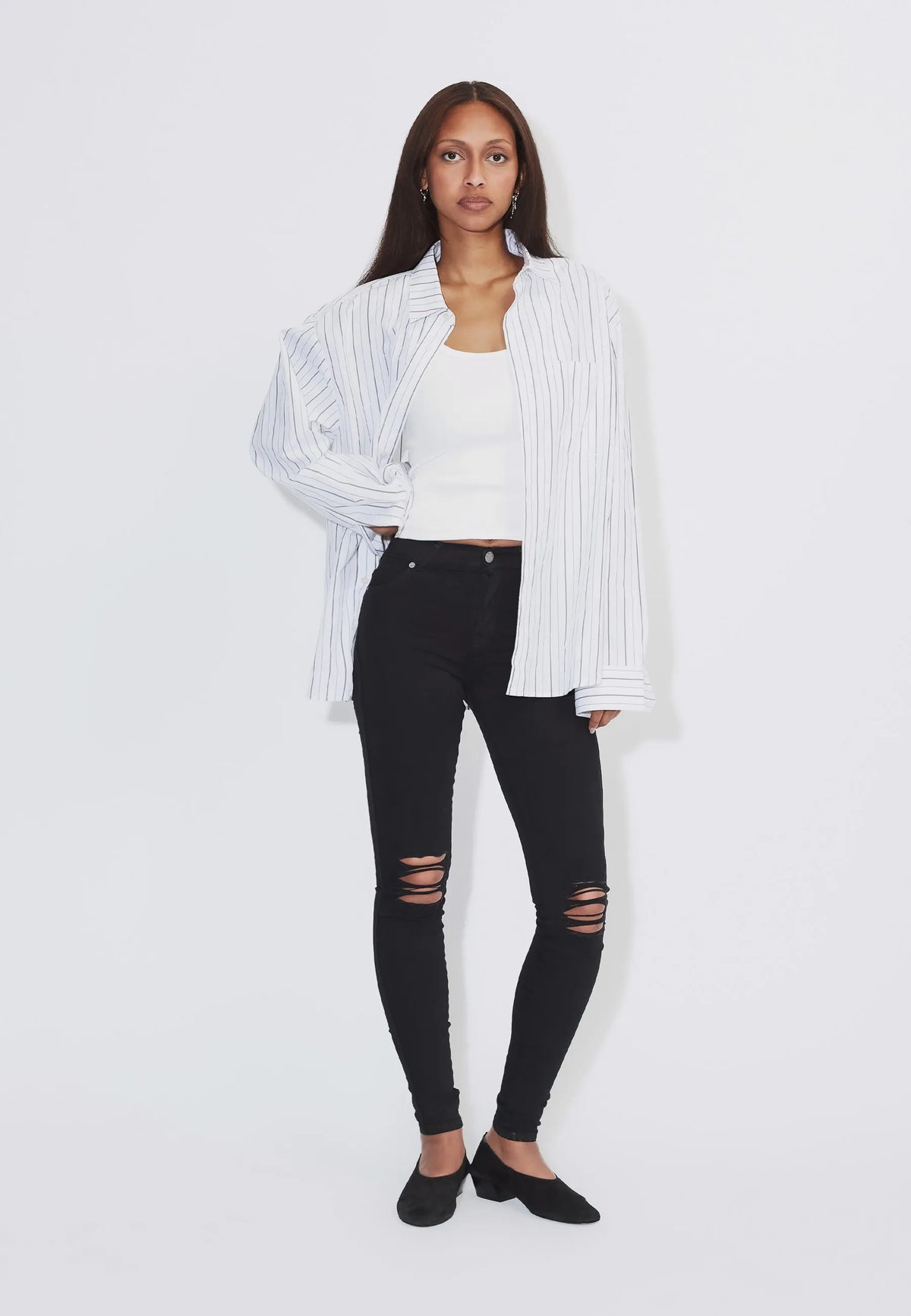1510111A03_DrDenim_LexyMidSkinny_BlackRippedKnees_Main_W1_1